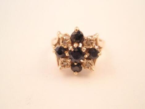 A 9ct gold sapphire and diamond cluster ladies dress ring