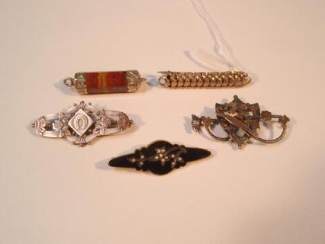 A collection of Victorian and other brooches and an agate set terminal