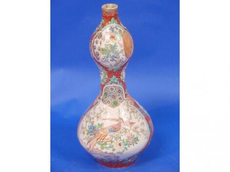 A 19thC Chinese famille vert double gourd vase