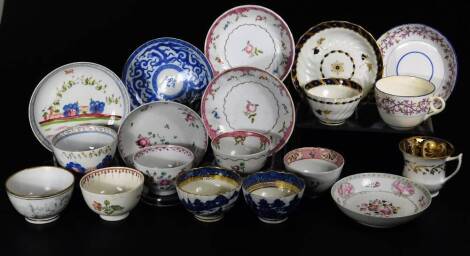 Various English and continental tea bowls, saucers, etc. to include an early 19thC Newhall tea bowl, 8cm Dia. and matching saucer polychrome decorated with roses, a Caughley tea bowl and saucer, with gilt highlights of ribbed decoration with blue crescent