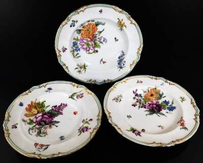 A 19thC continental porcelain part dinner service, each piece profusely decorated with handpainted flowers predominately in blue, green and orange, to include two lidded tureens, 30cm W, a pair of sauce dishes and covers, serving dishes, plates, etc. each - 2