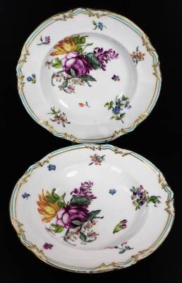 A 19thC continental porcelain part dinner service, each piece profusely decorated with handpainted flowers predominately in blue, green and orange, to include two lidded tureens, 30cm W, a pair of sauce dishes and covers, serving dishes, plates, etc. each - 3