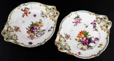 A 19thC continental porcelain part dinner service, each piece profusely decorated with handpainted flowers predominately in blue, green and orange, to include two lidded tureens, 30cm W, a pair of sauce dishes and covers, serving dishes, plates, etc. each - 4