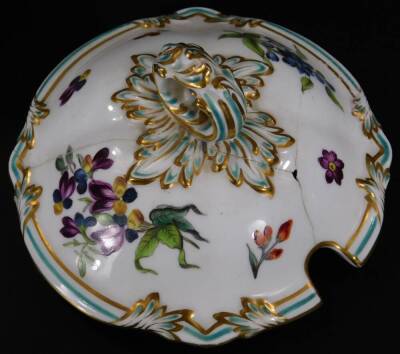 A 19thC continental porcelain part dinner service, each piece profusely decorated with handpainted flowers predominately in blue, green and orange, to include two lidded tureens, 30cm W, a pair of sauce dishes and covers, serving dishes, plates, etc. each - 7