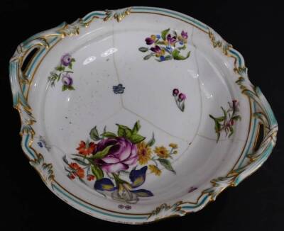 A 19thC continental porcelain part dinner service, each piece profusely decorated with handpainted flowers predominately in blue, green and orange, to include two lidded tureens, 30cm W, a pair of sauce dishes and covers, serving dishes, plates, etc. each - 11