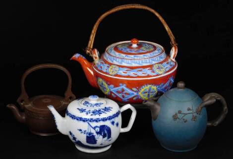 Various Chinese porcelain and pottery, a blue and white teapot decorated with sages, a turquoise ware teapot with raised floral pattern, bark type handle with seal mark beneath, red ware teapot, etc. (4)