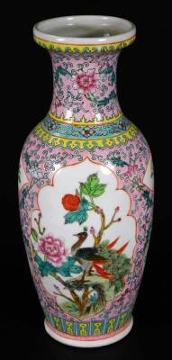 A 20thC Chinese porcelain vase, of shouldered form, decorated with panels of exotic birds in a naturalistic setting, predominately in pink and yellow, 32cm H, a Republic porcelain vase decorated with figures in a landscape, and a blue and white Ming type - 2