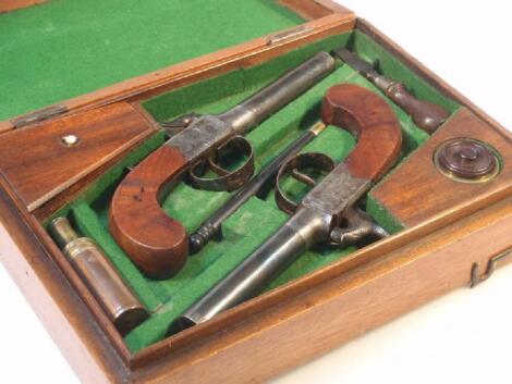 A pair of 19thC percussion dueling pistols by Hardmeat of Wisbeach (sic.