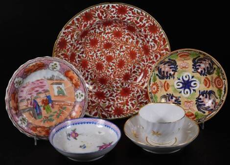 Various items of late 18th/early 19thC English porcelain, including a Coalport soup plate decorated in a red and gold floral pattern, a Newhall Boy In The Window pattern teapot stand, a Newhall saucer, a Wedgwood saucer with a gilt and white sprigged tea 