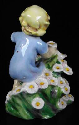 A Royal Worcester figure, representing May's child, wearing a blue dress and picking flowers, no. 3456, by F.C. Doughty no. 3455, black marked, 13cm H. - 2