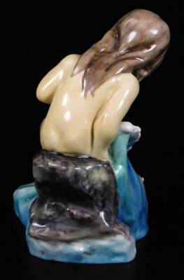 A Royal Worcester figure, representing August's child, sitting in the sea, no. 3441 by F.C. Doughty, 12cm H. - 2