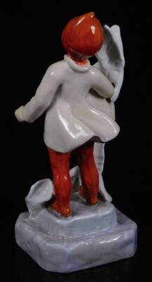 A Royal Worcester figure, representing November's child, wearing red trousers with white doves, no. 3416, by F.C. Doughty, black marked, 18cm H. - 2