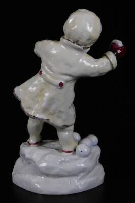 A Royal Worcester figure, representing December's child, playing snowballs, no. 3458, by F.C. Doughty, black marked, 17cm H. - 2