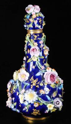 A 19thC Derby blue ground bottle vase and cover, c1835, decorated with apples and flowers and tooled gilt sprays, false crossed swords mark, 27cm H. - 2