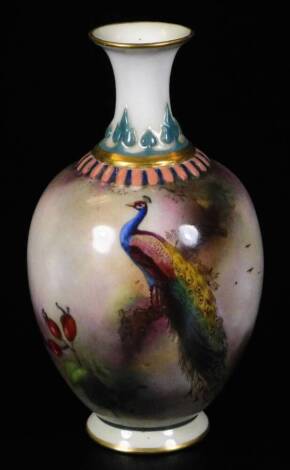 An early 20thC Worcester porcelain Hadley ware small vase, decorated with a peacock, 10cm H.