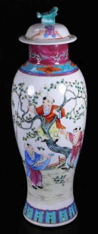 A Chinese Republic Porcelain vase, finely decorated with figures at play, some in trees, polychrome decorated predominately in green, pink and yellow, with compressed ring with inner turquoise decoration, on a circular foot, seal mark beneath, with associ