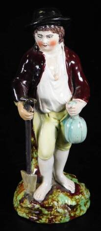 A late 18thC Pearlware figure The Gardener, after The Ralph Wood original, polychrome decorated predominately in brown, yellow and green, the standing figure on a naturalistic base, unmarked, 20cm H.