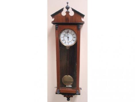 A 19thC walnut cased single weight Vienna wall clock