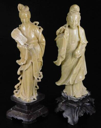 Two jadeite style figures, of females, the first in flowing robes holding bottle, on inverted base, 30cm H, the second holding fan. (2)