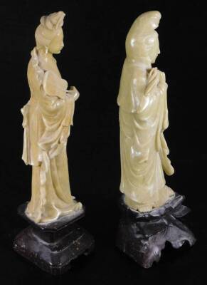 Two jadeite style figures, of females, the first in flowing robes holding bottle, on inverted base, 30cm H, the second holding fan. (2) - 4