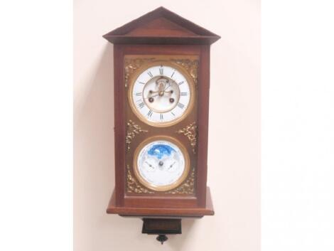 A twin dial wall clock