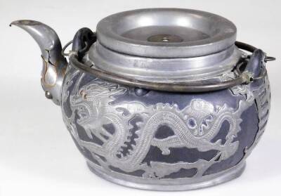 A Weihaiwei Deh Yu four piece tea service, each piece raised with dragons, to include teapot, 10cm H, two handled sugar bowl, etc. each marked beneath. (4) - 7