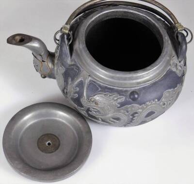 A Weihaiwei Deh Yu four piece tea service, each piece raised with dragons, to include teapot, 10cm H, two handled sugar bowl, etc. each marked beneath. (4) - 8