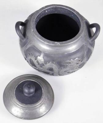 A Weihaiwei Deh Yu four piece tea service, each piece raised with dragons, to include teapot, 10cm H, two handled sugar bowl, etc. each marked beneath. (4) - 19