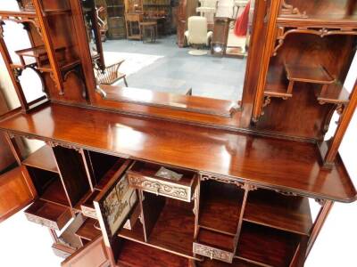 An exceptional 19thC Edwards & Roberts Japonesque rosewood Shodhana cabinet, the mirror inset aesthetic movement superstructure with an arrangement of canopied shelves on carved brackets, the top of the lower part with curved ends, having six doors with o - 3