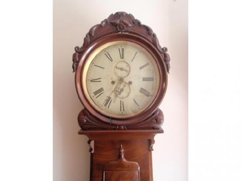 An early 19thC flamed mahogany longcase clock