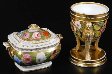 A Spode sucrier and cover, c1825, decorated with polychrome flower sprays on a gilt ground below a chain link border, 11cm H, together with a Spode potpouri vase of egg form, supported on an Egyptian figures on a circular base, decorated with flowers on a