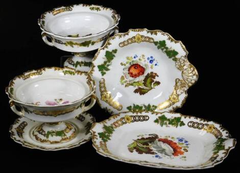 A part Daniel service pattern no. 4339, consisting of a pair of sauce tureens and one stand, oval dish and platter decorated with floral sprays below a mounted grape vine border, picked out in green and yellow. (5)