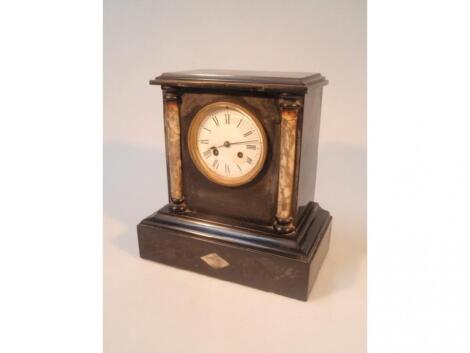 A Victorian polished slate and golden onyx column mantel clock of architectural form