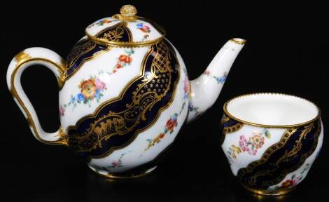 A late 18thC Sevres cabaret teapot cover and sucrier, decorated with blue ground swirls and flower sprays, blue Sevres mark and decorators letter H and no.3, incised X mark, teapot 12cm H. (3)