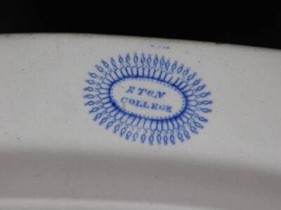 A 19thC Eton College blue and white meat plate, of oval form, transfer printed with a floral border, marked beneath, 41cm W. - 3