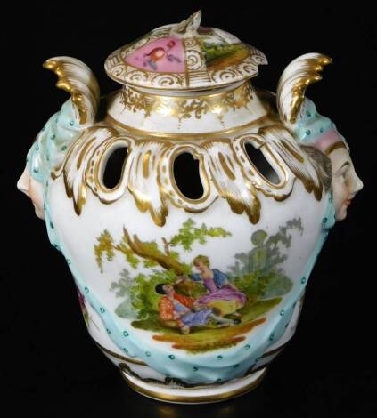 A late 19thC KPM porcelain pot pourri vase and cover, of shouldered circular form, hand painted with panels of figures before trees, with moulded mask handles and a compressed gilt highlighted lid, on a circular foot, blue line mark beneath, 15cm high.