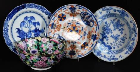 A Chinese export porcelain blue and white dish, of circular form, decorated with flowers, 22cm Dia., Imari plate, probably Chinese, a shaped dish and a polychrome decorated bowl marked Made In China. (4)