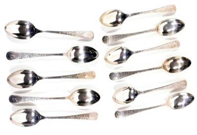 A set of six George V silver teaspoons, old English pattern bright cut decorated with initials, 1927 and 1928, 10cm W, and five further silver teaspoons, 4½oz. (a quantity)