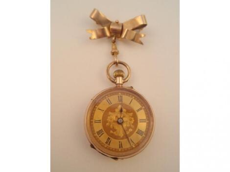 A ladies fob watch on bow brooch