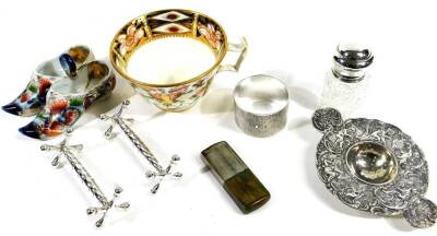 Various silver and effects, to include a George V silver napkin ring, engine turned, Birmingham 1929, 5cm Dia. 1oz, a tea strainer heavily repoussé decorated with pierced centre, two knife rests, silver topped glass jar, pocket lighter, early 19thC Crown