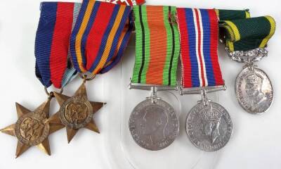 Various medals, associated ephemera, buttons, figures, photographs, postcards, to include a WWI medal trio, with 1914-15 V Star, Campaign and Victory medals, each similarly marked 4554 DVR S D Brown RA, associated postcards and ephemera including a photo - 3