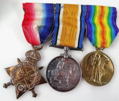 Various medals, associated ephemera, buttons, figures, photographs, postcards, to include a WWI medal trio, with 1914-15 V Star, Campaign and Victory medals, each similarly marked 4554 DVR S D Brown RA, associated postcards and ephemera including a photo - 4