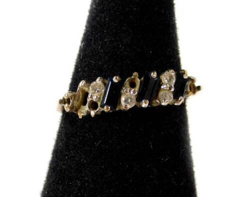 A 9ct gold dress ring, with blue and white paste stones (some missing), 1.9g all in.