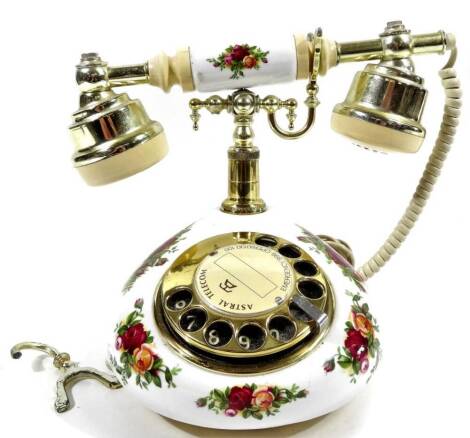 A Royal Albert Old Country Roses telephone, the body 6cm H.