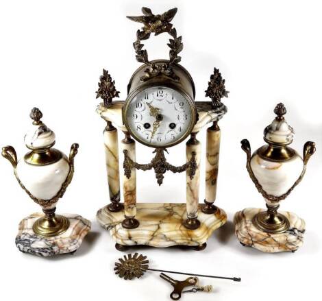 A marble, brass and gilt metal clock garniture, comprising clock, with bird and garland finial, raised above a 9cm Dia. face with enamel Arabic dial, on cylindrical pillars terminating in a shaped base on squat feet, and two urn garniture, in neo-classica