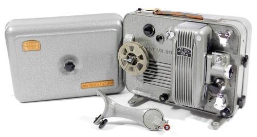 A Zeiss Icon Movilux 8B film projector, with outer leather case, 27cm W.
