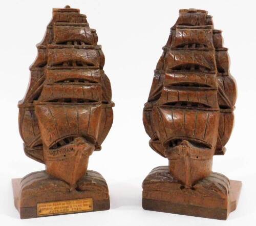 A pair of early 20thC ship headed bookends, one with plaque, from the teak of HMS Iron Duke Admiral Jellicoe's flagship Jutland 1916, 21cm H. (2)
