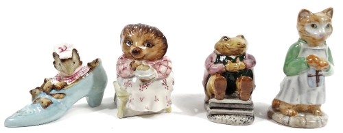 Various Beswick Beatrix Potter figures, comprising of Ginger, 10cm H, Mr Jackson, The Woman Who Lives In A Shoe and Mrs Tiggy-Winkle, marked beneath. (4)