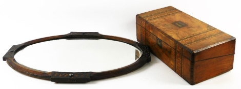 A mid 19thC walnut and Tunbridge writing box, of rectangular form, with vacant cartouche and part fitted interior, 50cm W, and an oval mirror, broken by blind fret ebonised carving. (2)