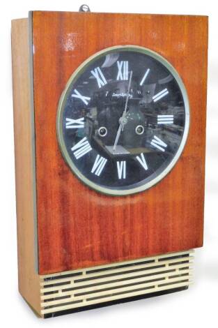 A Jantar vintage wall clock, in rectangular case, with grill base, 20cm Dia. Roman numeric dial, marked MADE IN USSR, with two winding holes, 8-day half striking chiming movement, 43cm H.